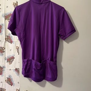 Women’s bicycling shirt. Beautiful purple. Short sleeves. 3 pockets on the back.
